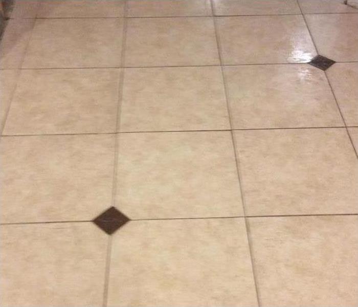Clean whit tile floor.