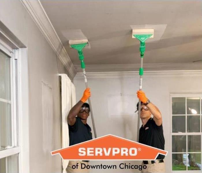 SERVPRO techs cleaning 