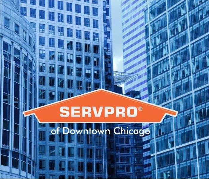 Blue buildings with the SERVPRO house logo in front